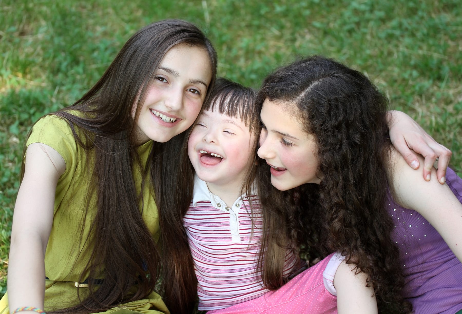 Image of three girls playing as friends