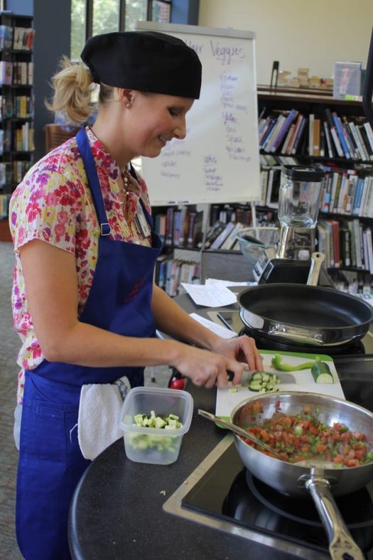 Lori Carlson MS, RDN, LDN teaching a cooking class