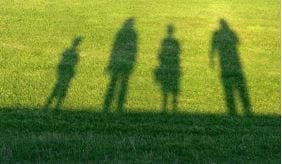 Shadow of Four People on Lawn