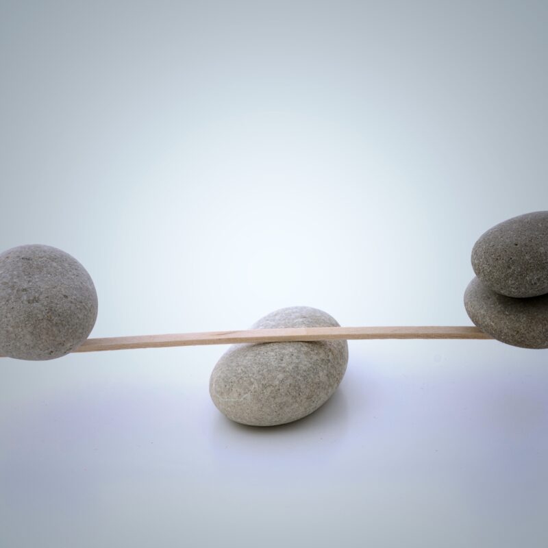 Pebbles balanced on a stick