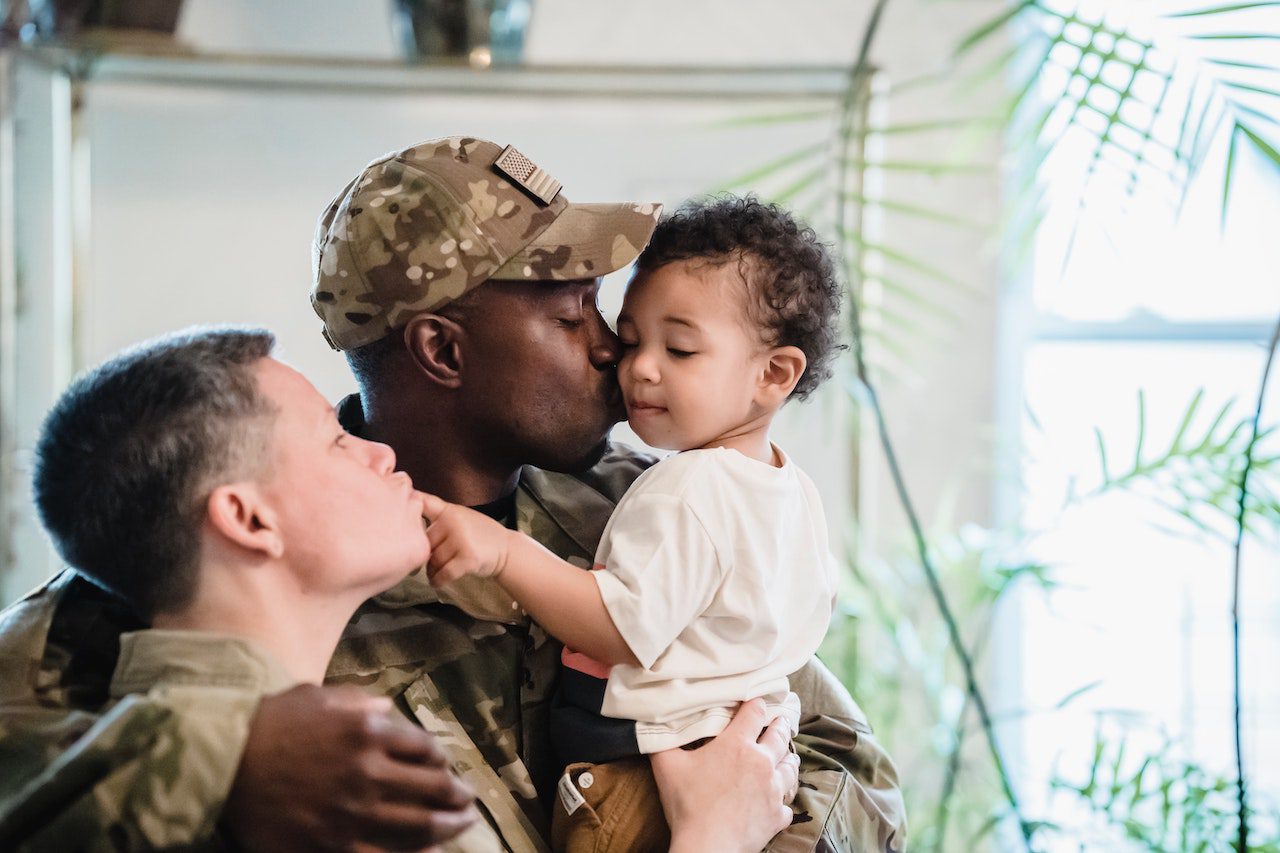 Photo of military parents and baby