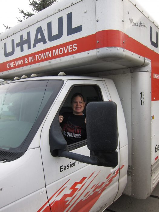 Woman driving U-Haul truck