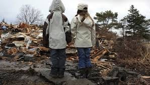 Children holding hands in a disaster