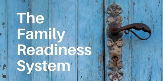 The Family Readiness System banner. Metal door handle on blue door.