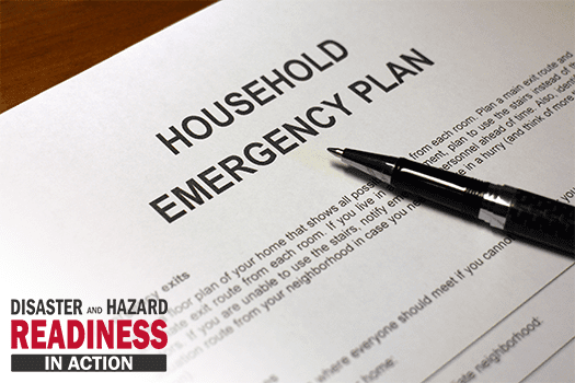 An image of a pen on a "Household Emergency Plan" document