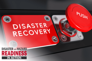 A large red push button with the words "Disaster Recovery" written by it.