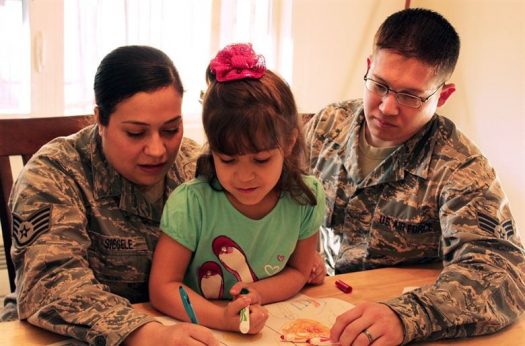 military parents drawing with their child