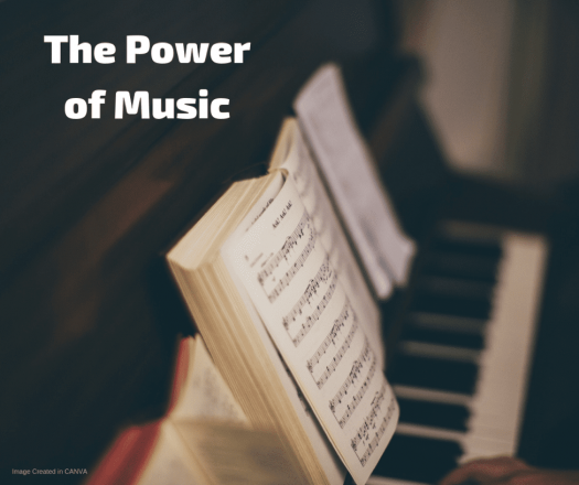 Piano with music under the words "The Power of Music"
