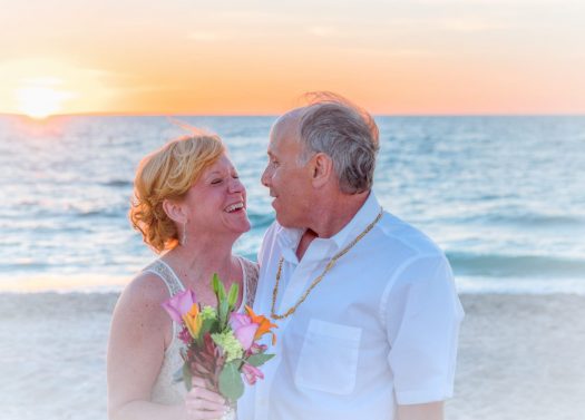 Senior couple getting married on the beach
