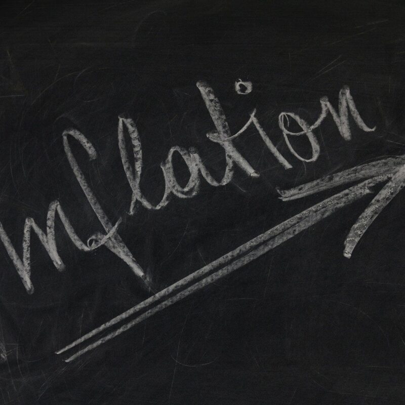 Chalk board that says "inflation"