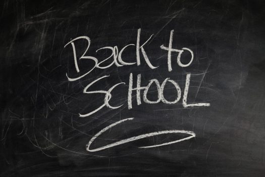 "Back to School" written in chalk on blackboard