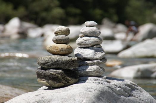 Two stacks of round stones