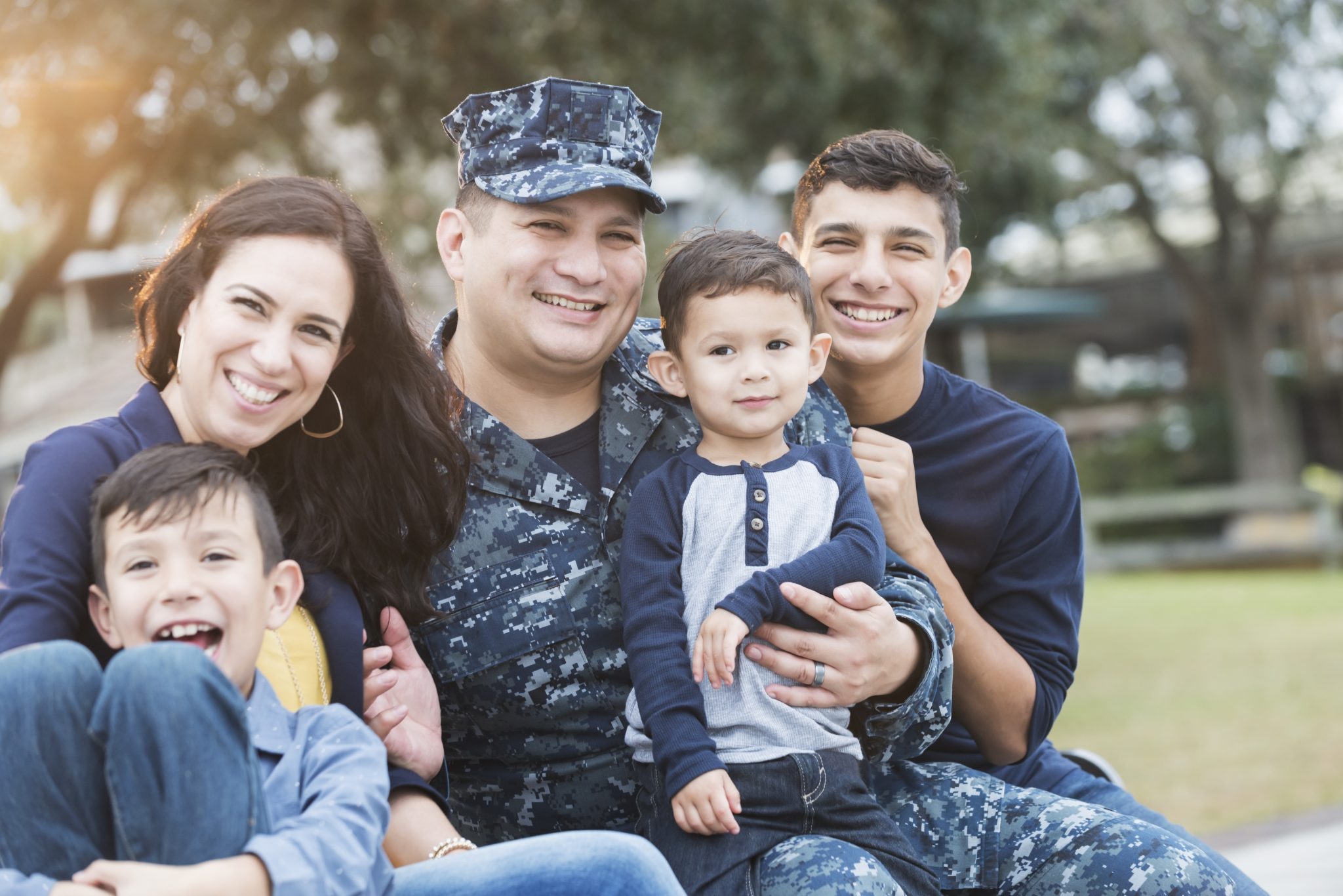 Hispanic military man with his family