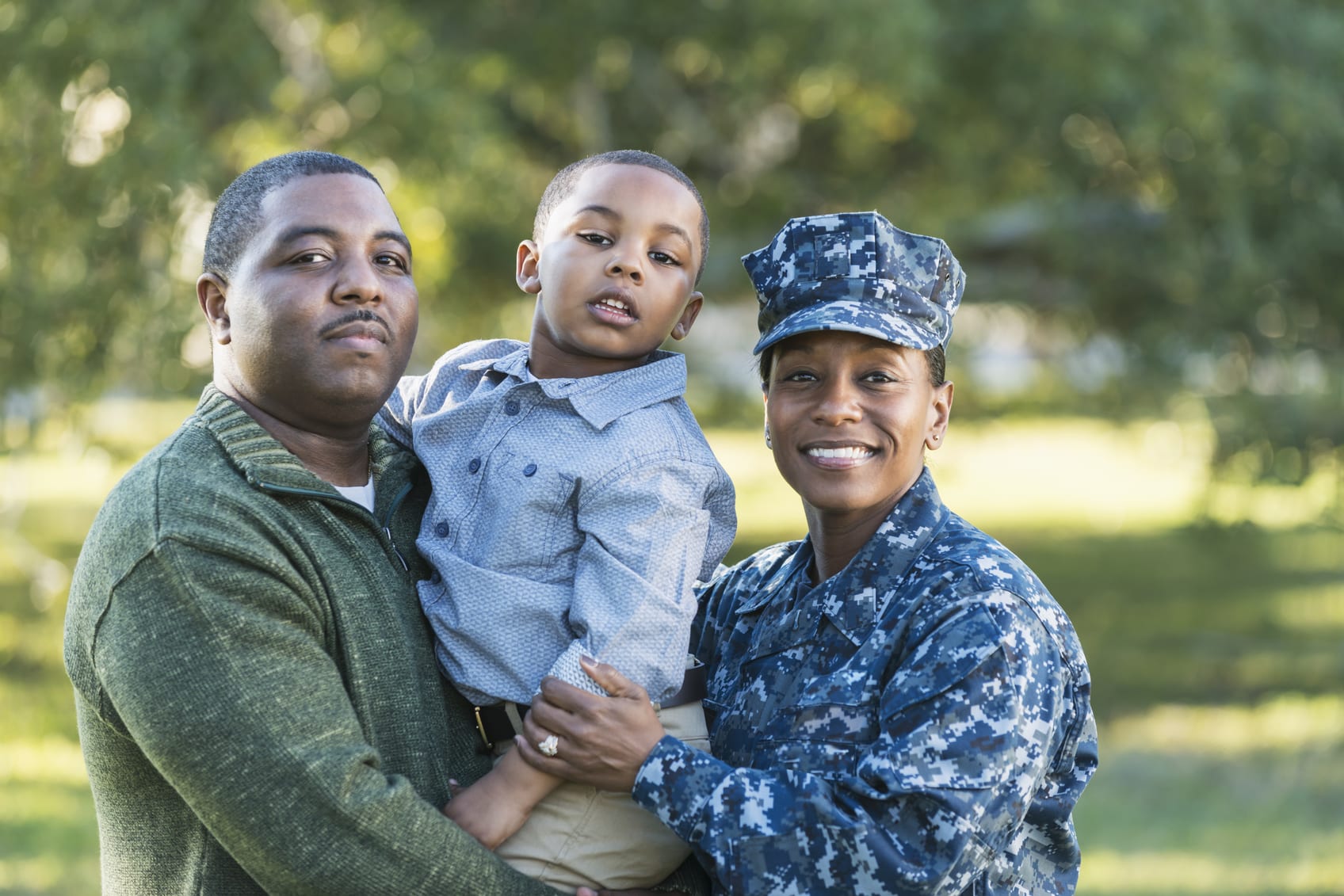 Military homecoming, navy servicewoman with family
