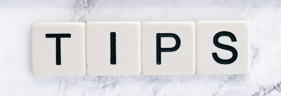 Scrabble Game tile letters spell out the word TIPS