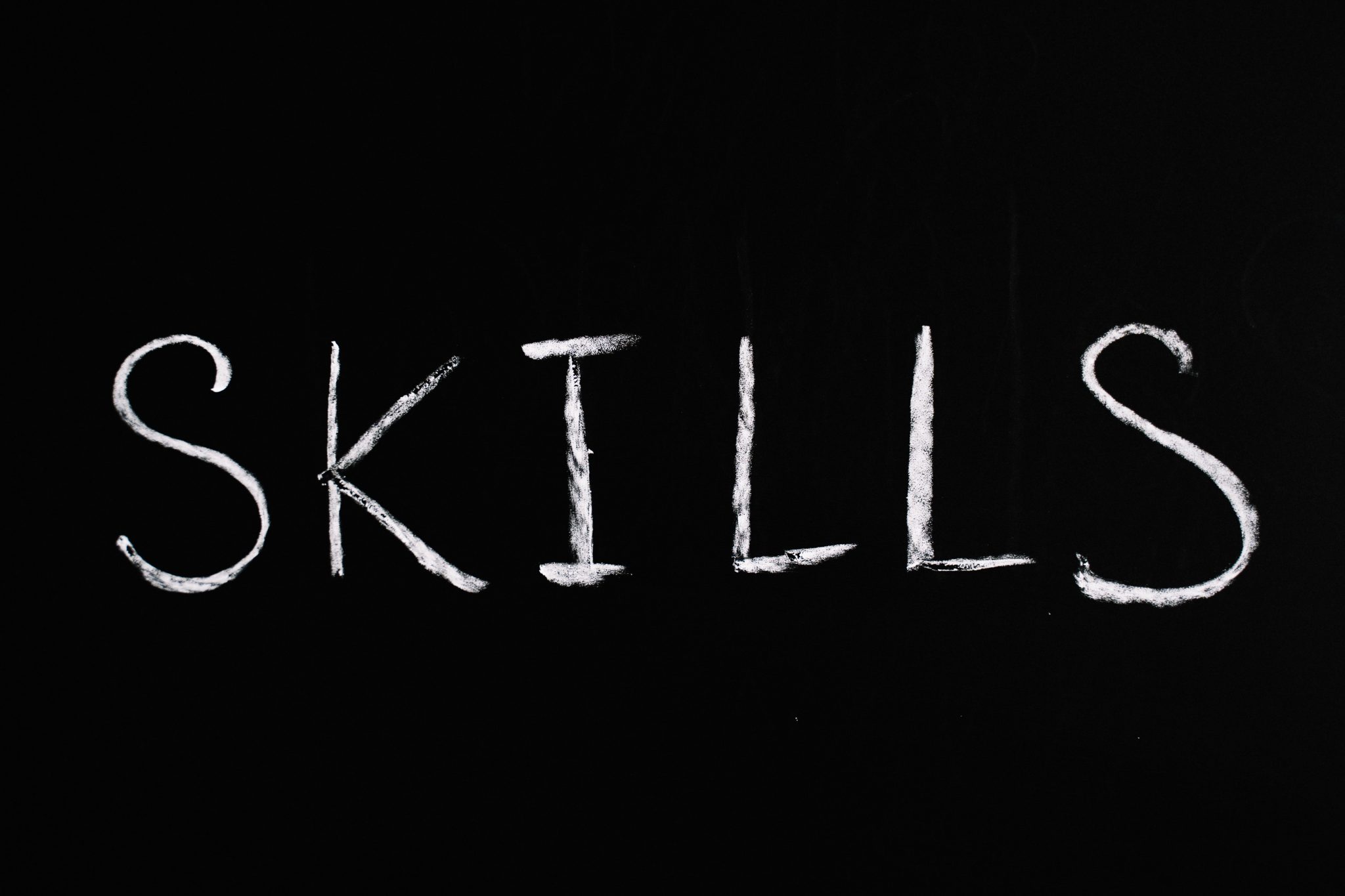 The "skills" in white on a black background