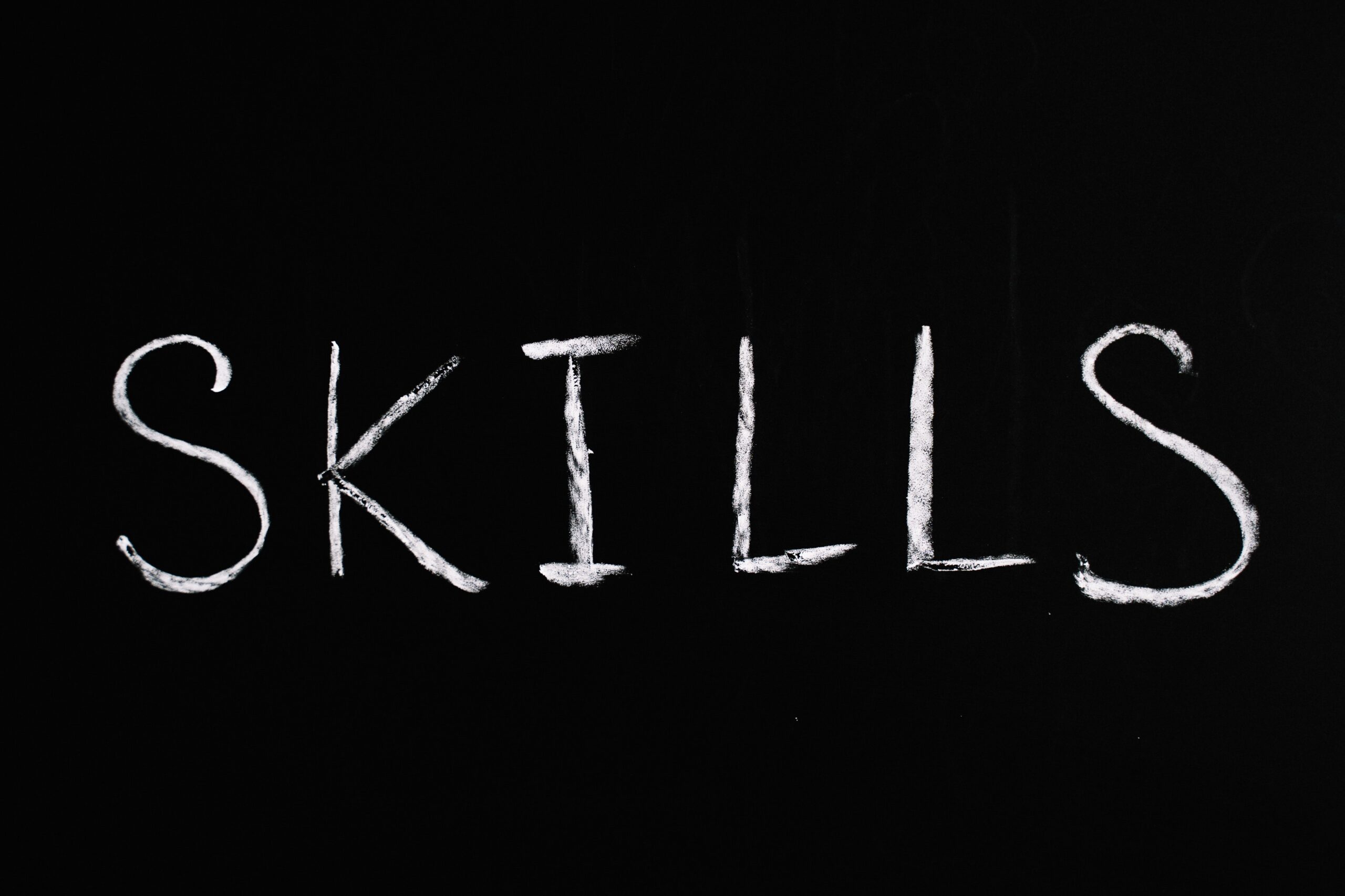 The "skills" in white on a black background