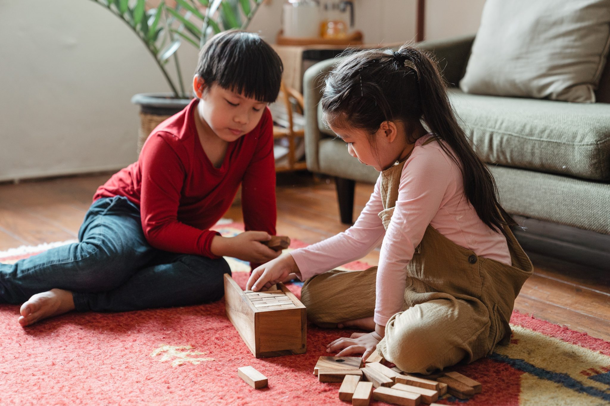 Kids Playing With Wooden Blocks