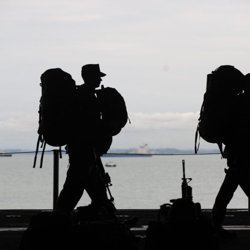 Silhouette of soldiers walker