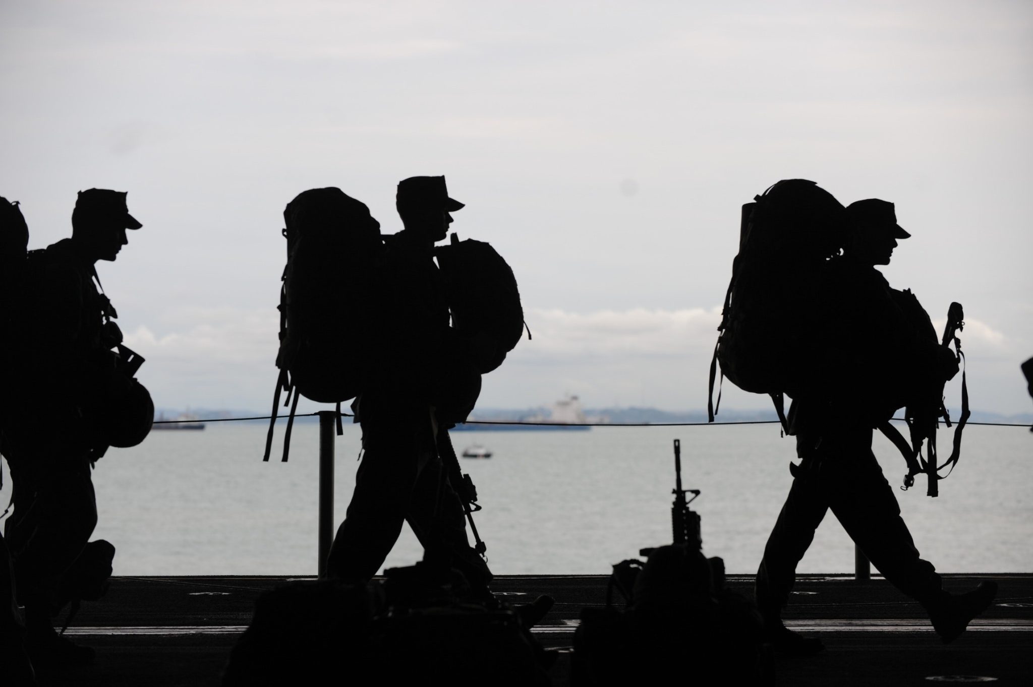 Silhouette of soldiers walker