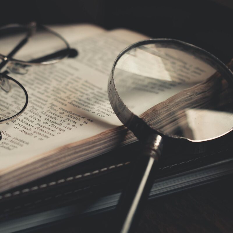 Magnifying glass, glasses, book