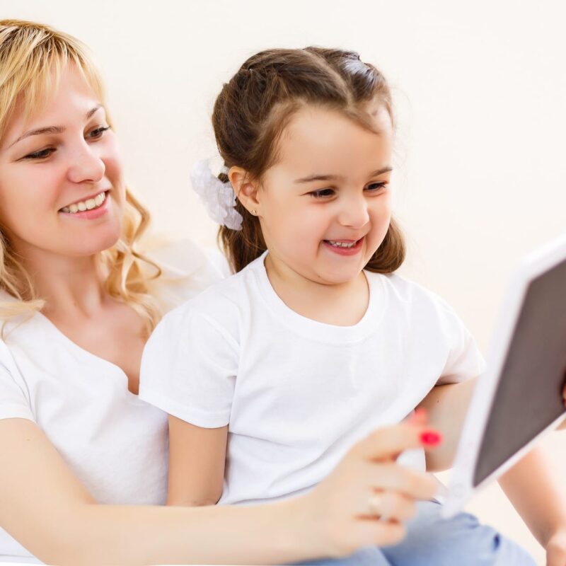 mother and daughter with tablet