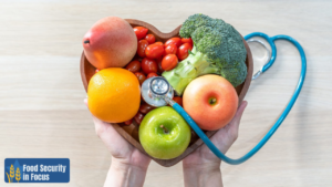 Produce and stethoscope positioned in the shape of a heart.