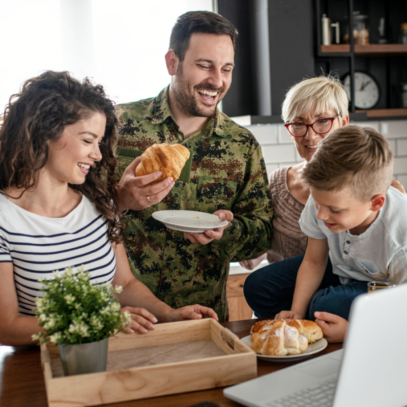 American soldier finally at home with his family stock photo