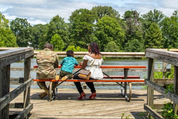 Military Family Sitting at a Picnic Table
