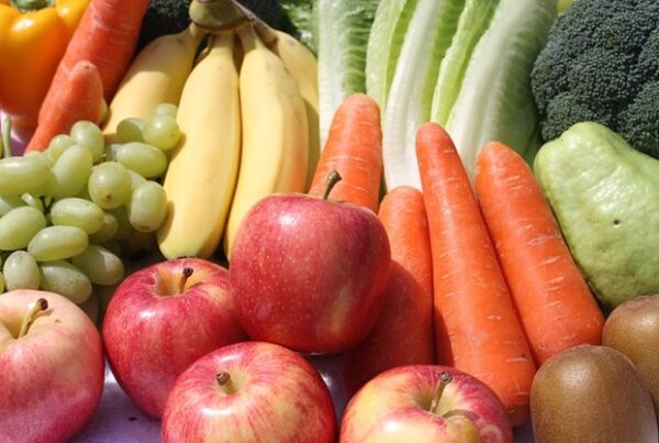 Fresh apples, carrots, bananas, grapes, lettuce, kiwi, peppers and pears