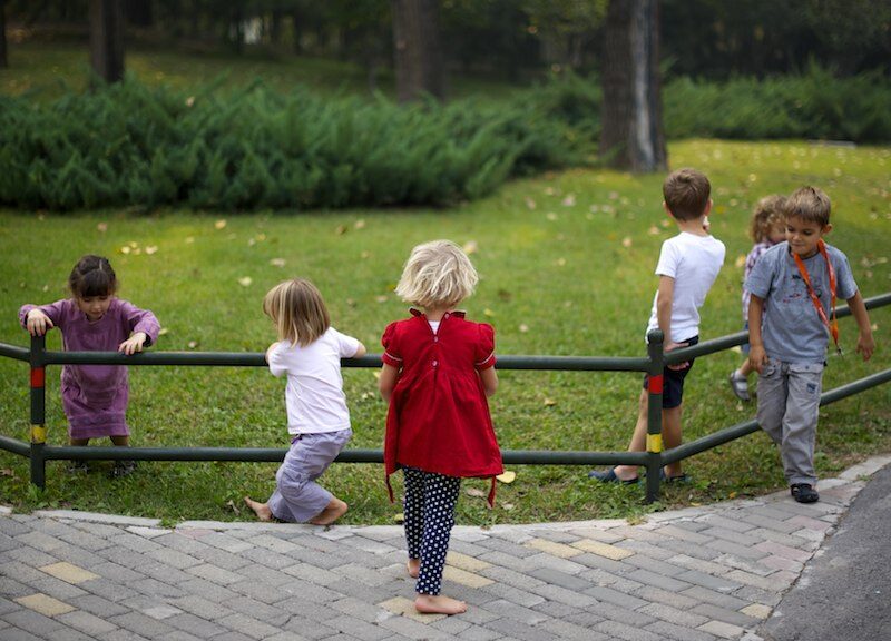 Young children playing in a park
