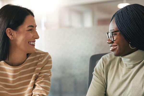 two women having a meeting in an office