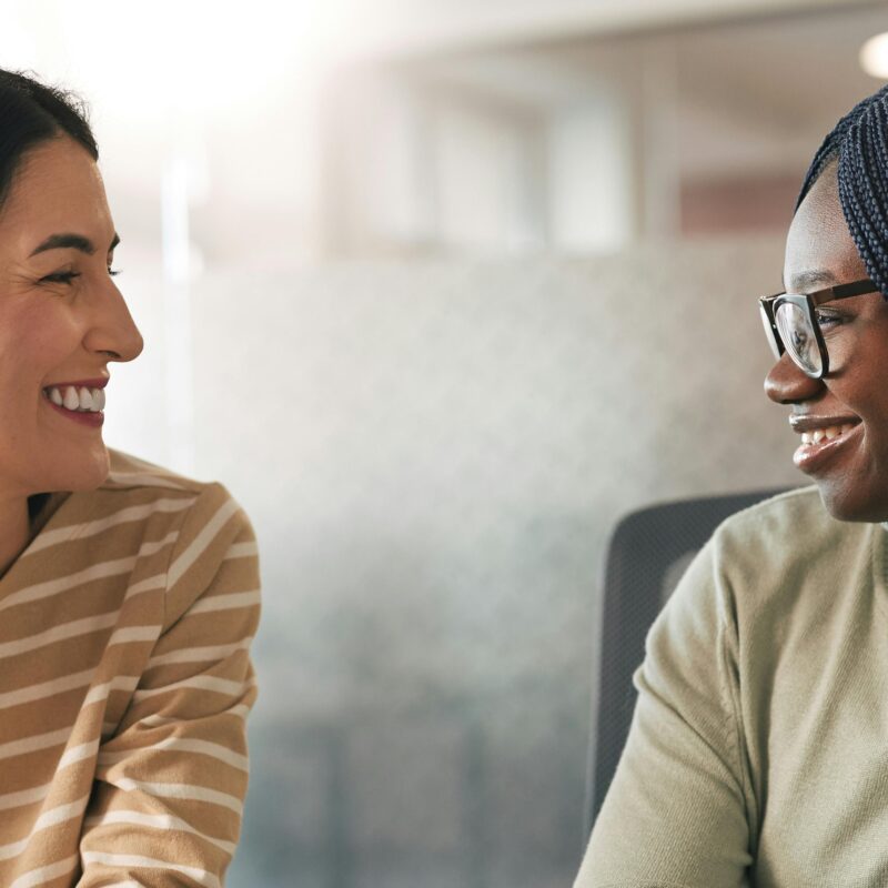 two women having a meeting in an office