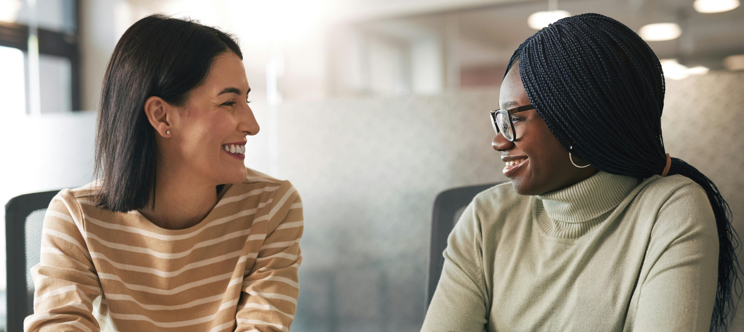 two women having a meeting in an office