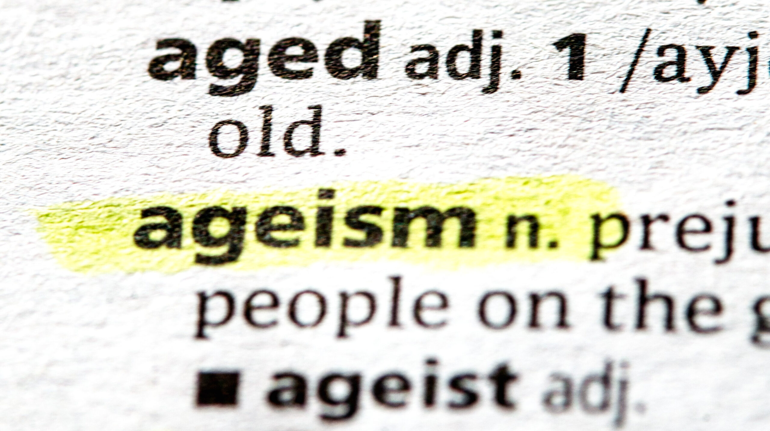 Close up photo of the word ageism