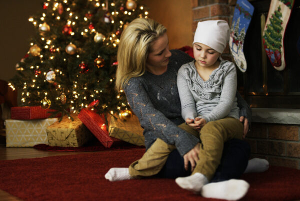 Little Girl with Cancer at Home with Her Mom