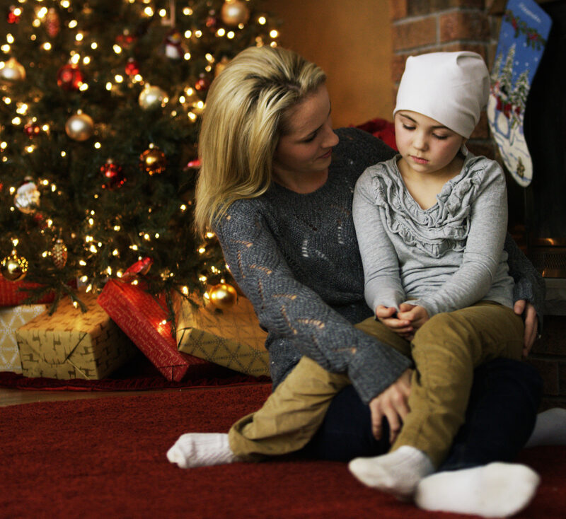 Little Girl with Cancer at Home with Her Mom