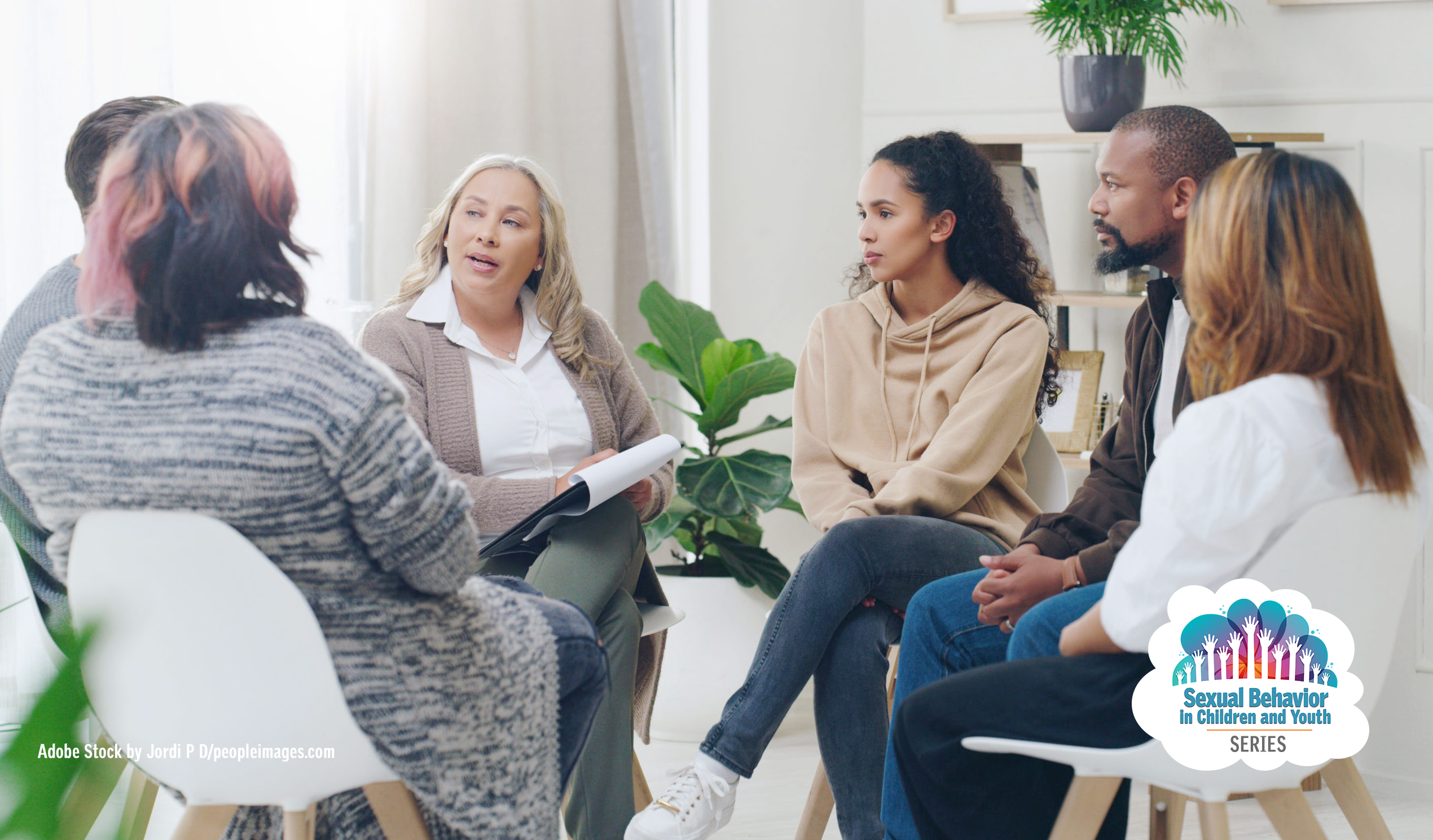 Counseling group sitting in a circle having a discussion