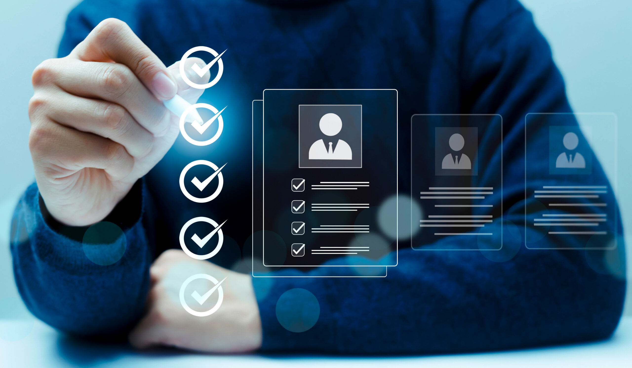 Hand selecting candidate profile with check mark icons on virtual interface