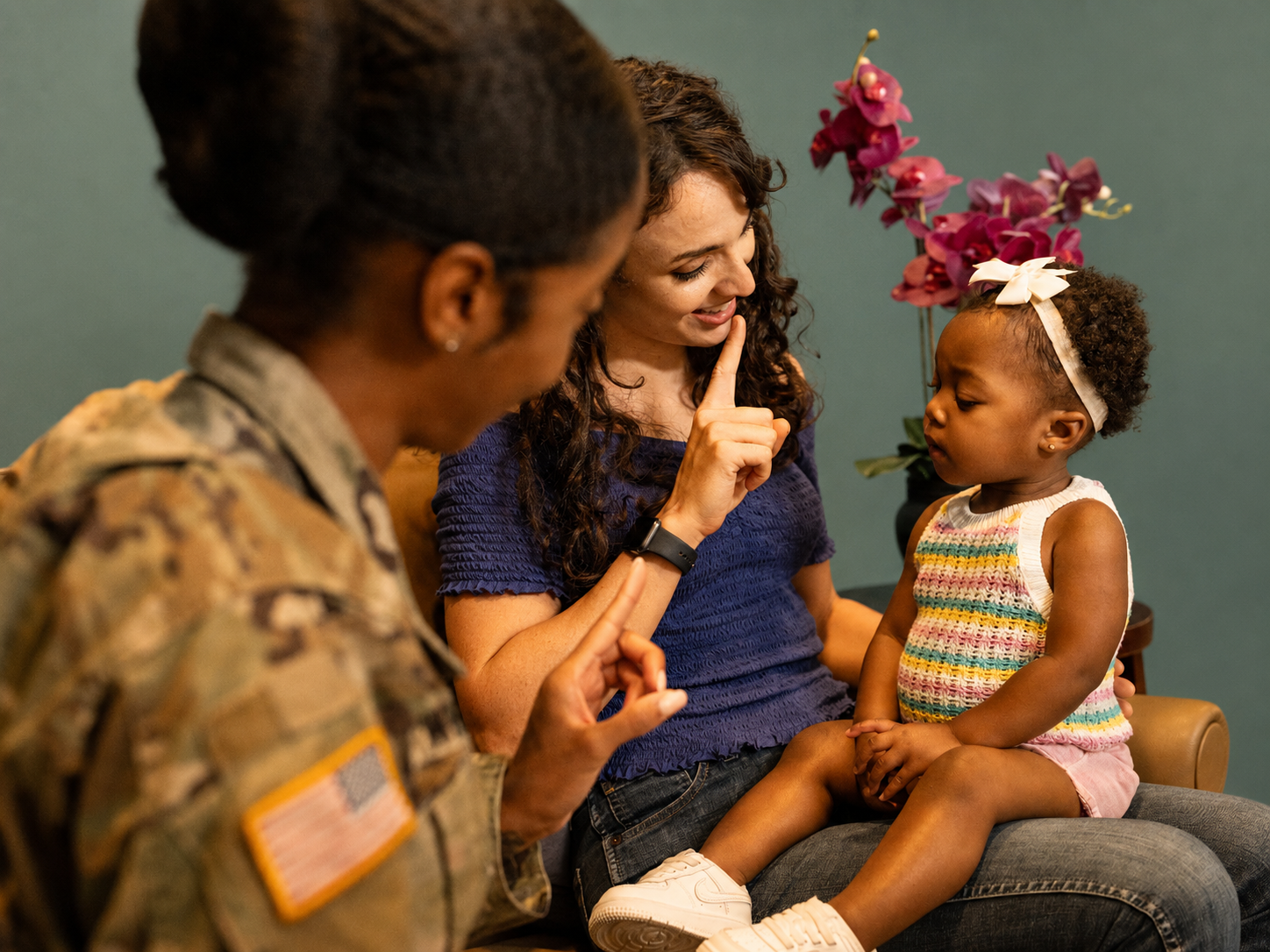 service provider working with young child and service member
