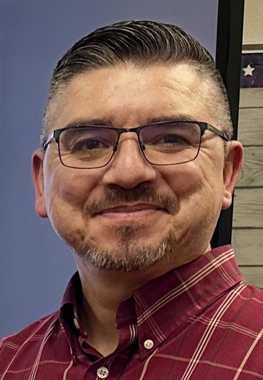smiling headshot of presenter Rich Gomez